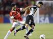Brazilian Internacional's Eltom (L) vies