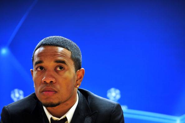 AC Milan's coach midfielder Urby Emanuel