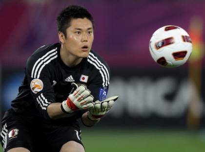 Japan's goalkeeper Eiji Kawashima prepar