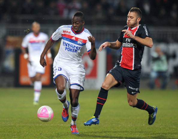 Lyon's French defender Aly Cissokho (L)