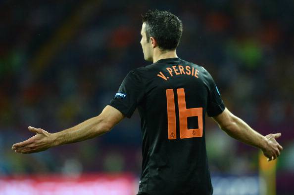 Dutch forward Robin van Persie holds his