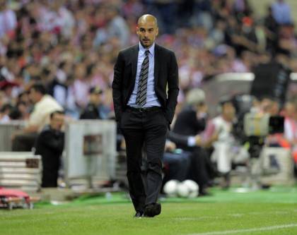 Barcelona's coach Josep Guardiola looks