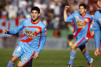 Arsenal's Lisandro Lopez celebrates his
