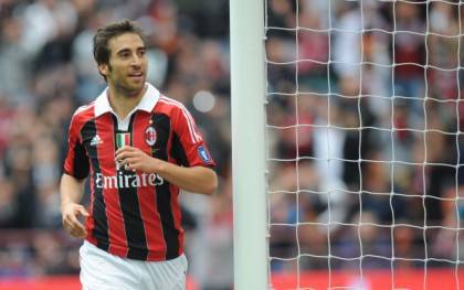 AC Milan's Mathieu Flamini celebrates af