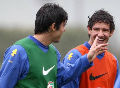Brazilian player Kaka (L) jokes with tea
