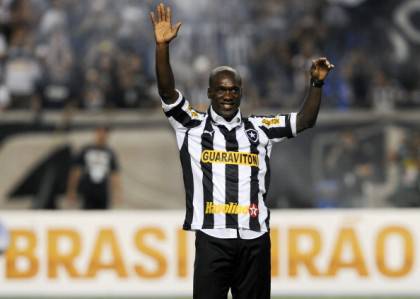 Dutch footballer Clarence Seedorf waves