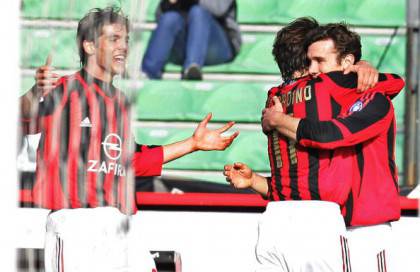 AC Milan's forward Andriy Shevchenko (R)