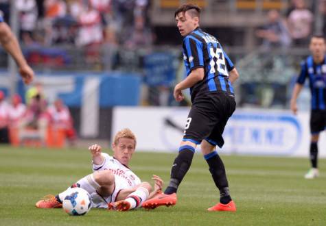 Keisuke Honda vs Daniele Baselli (Getty Images) 