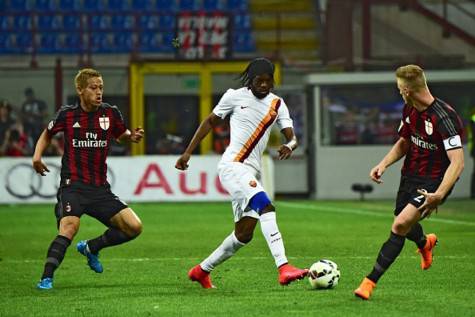 Gervinho vs Honda & Abate (Getty Images) 