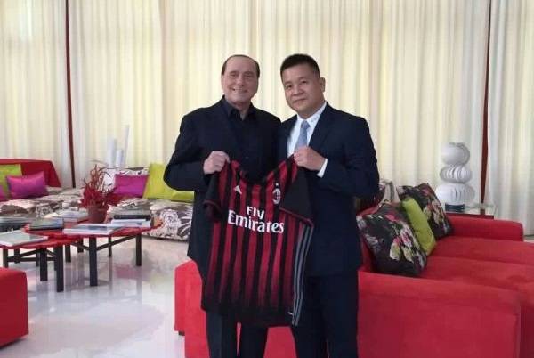 Silvio Berlusconi e Yonghong Li