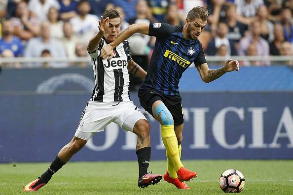 Davide Santon e Paulo Dybala