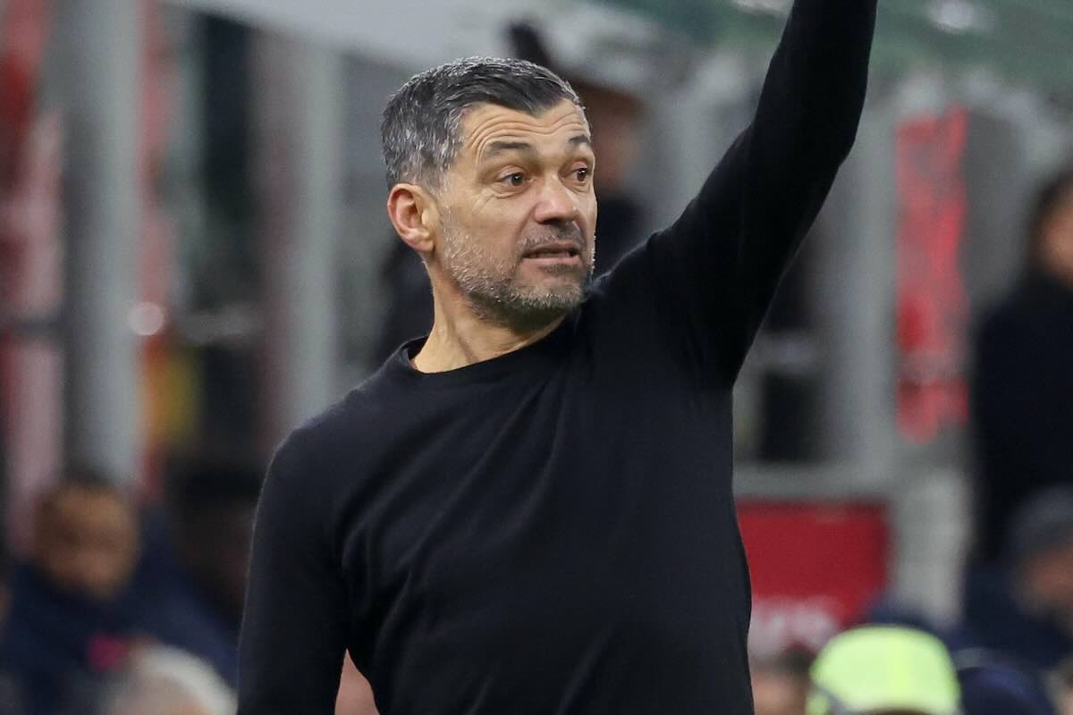 Conceicao con il braccio alzato
