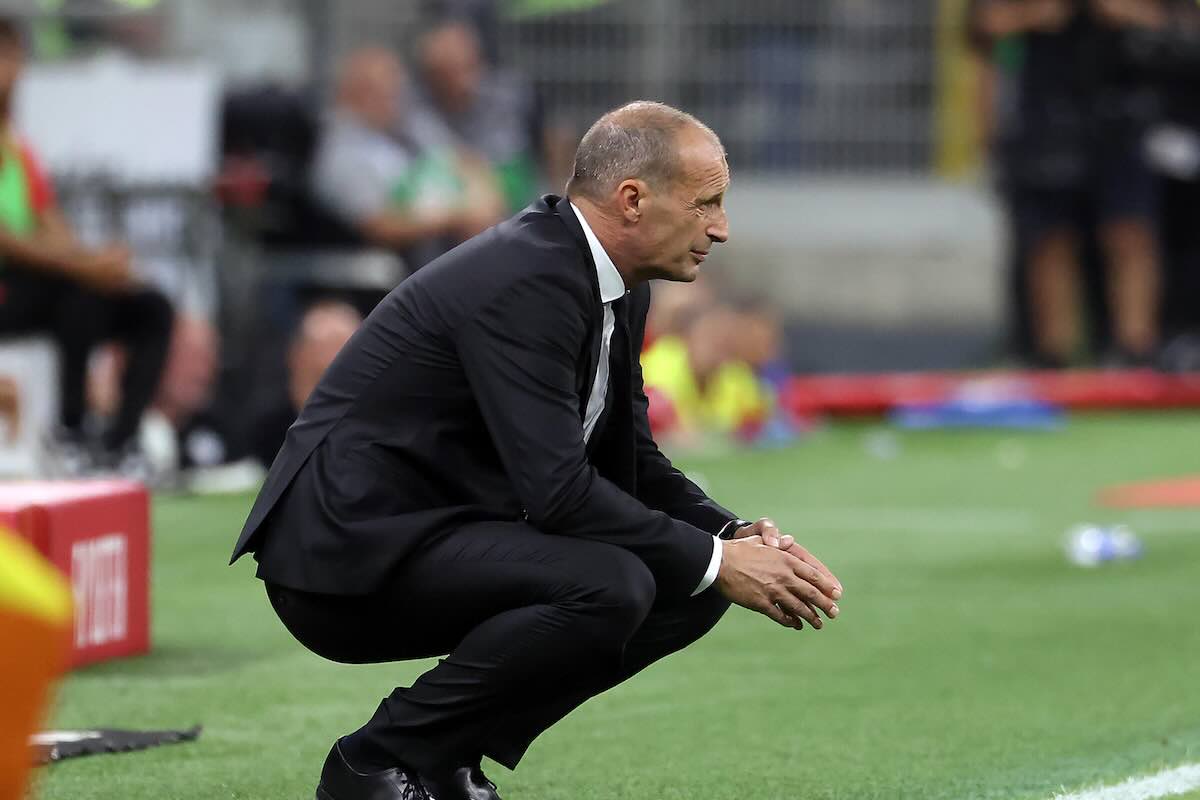 Allegri accovacciato